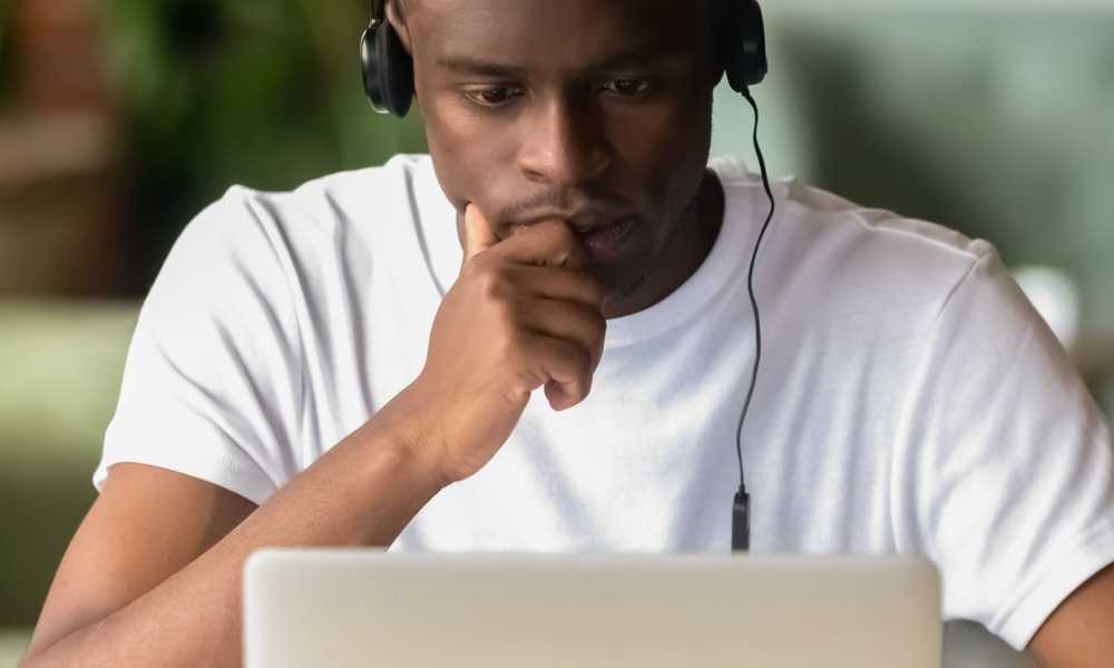 Man studying with headphones